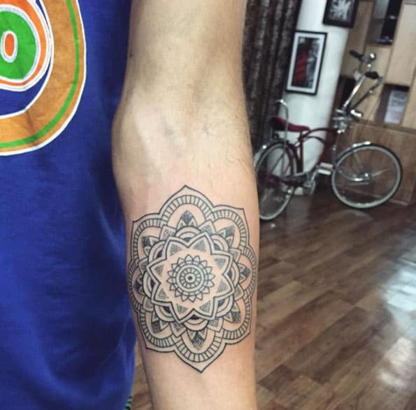 Soft mandala flower on forearm by Nyoman Buch Permana