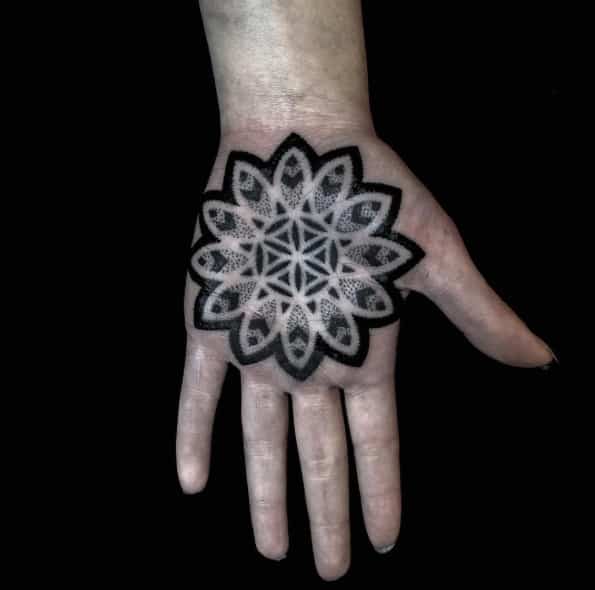 Mandala flower on palm by Helsinki