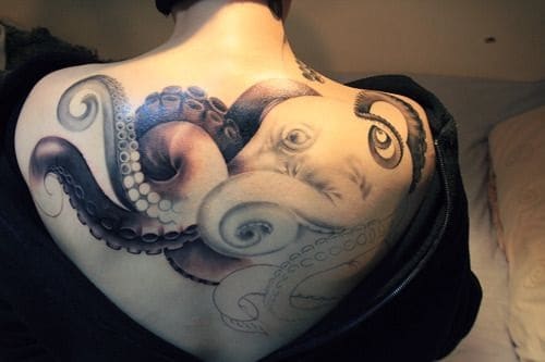 Purposely Unfinished Octopus Tattoo On Woman Back