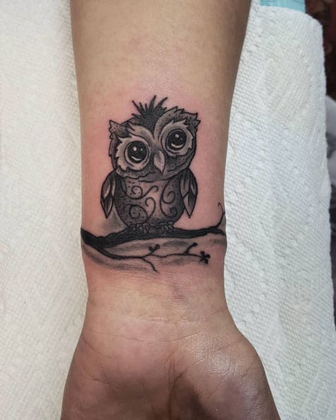 Owl Tattoo on Wrist by Andrew Hullings