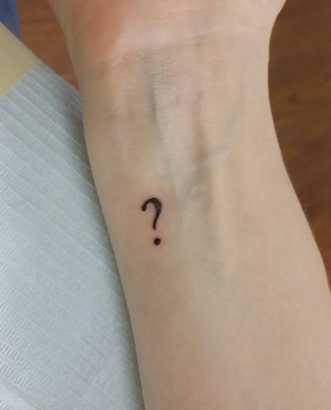 Question Mark Tattoo on Wrist by Brittan Puronen