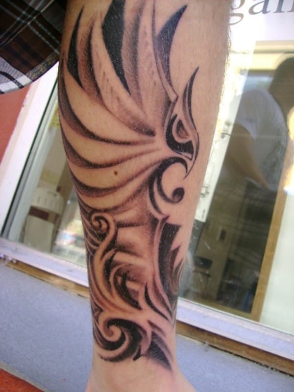 Beautiful-tribal-tattoo-idea-on-calf