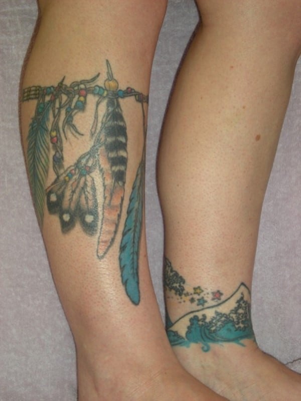 Cool-feather-calf-tattoo-idea