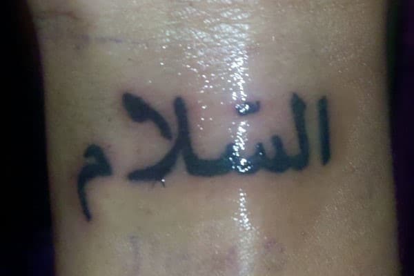 In Arabic Tattoo