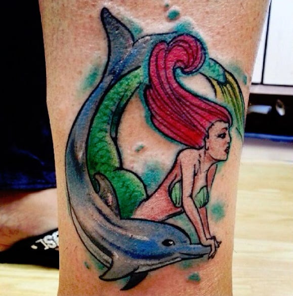 ariel-swimming-with-dolphins-tattoo