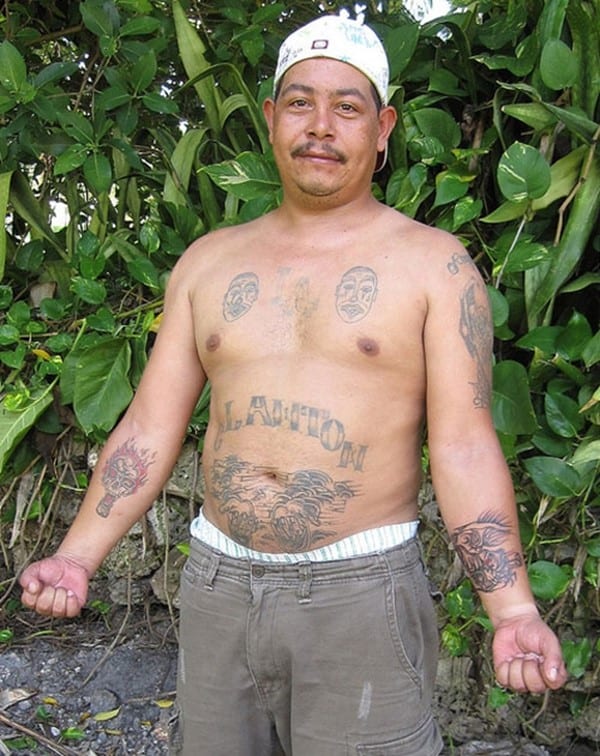 gang member with tattoos