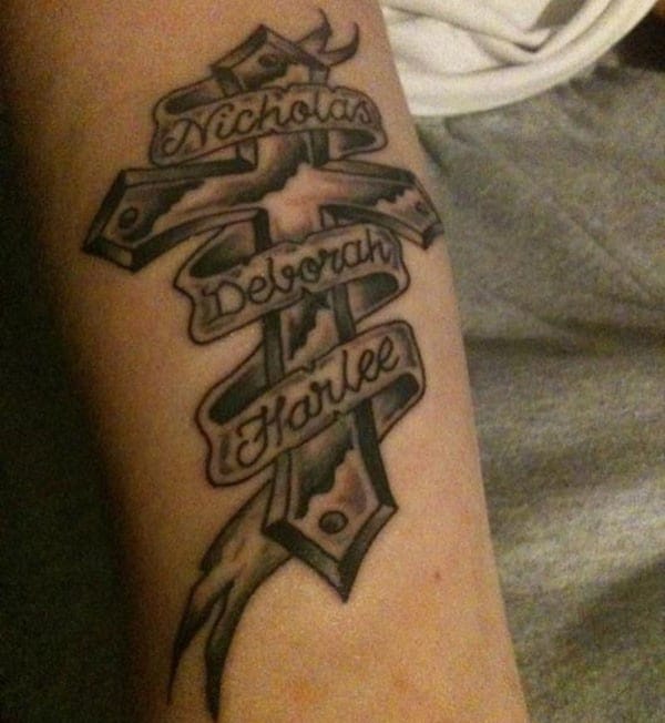 Inspiring Tattoos Tumblr. cross with name tattoo on arm. 