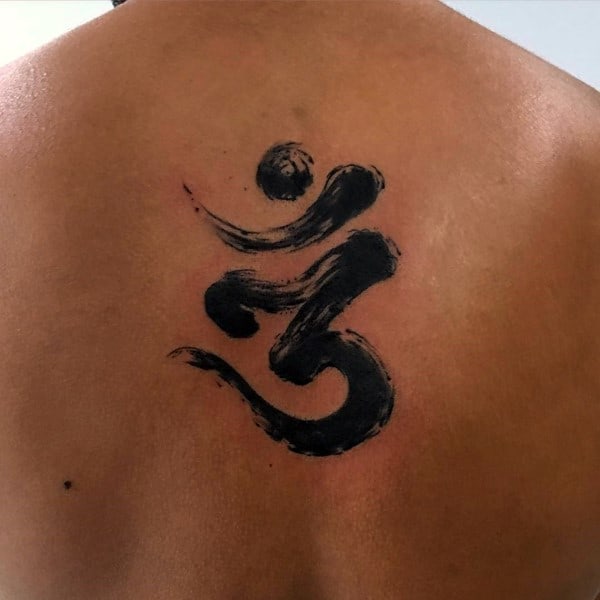 Brush Stroke Tattoo Of Om On Mans Back