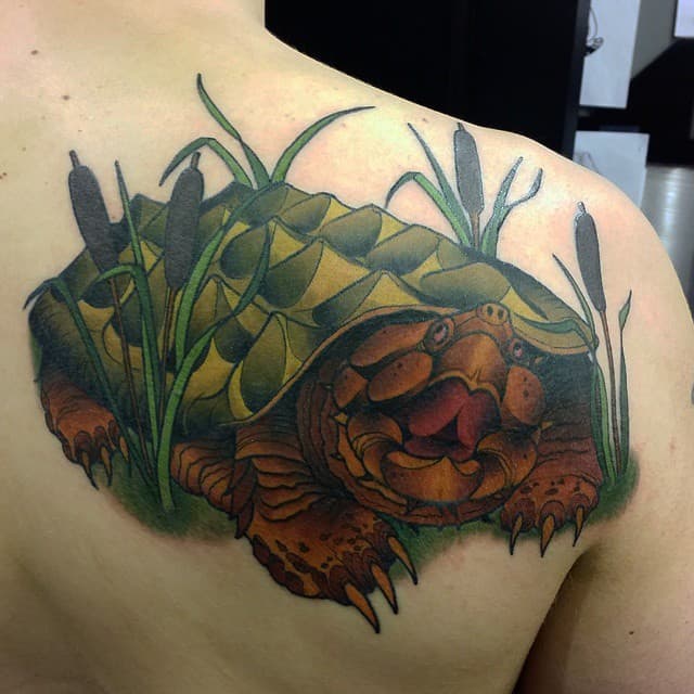 Turtle Tattoos. grass and turtle back tattoo. 