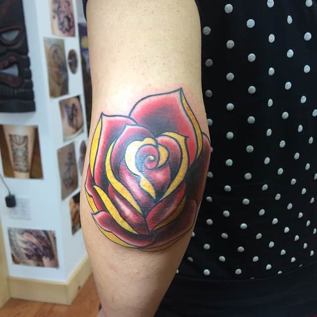 Harry Styles Gets Rose Tattoo on His Elbow