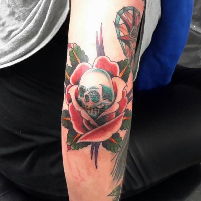 Tattoo of Pointillism Skulls Elbow