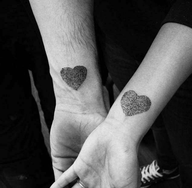 Heart-Shaped Finger Print Tattoos by Ugnius Bružinskas