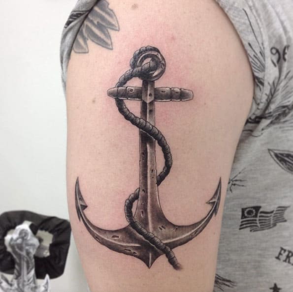 Black Ink Anchor Tattoo On Man Chest