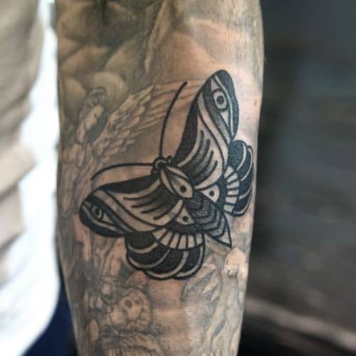 Black Butterfly on Arm Tattoo
