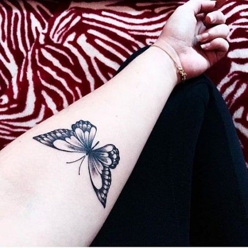 Black Butterfly Tattoo on Arm