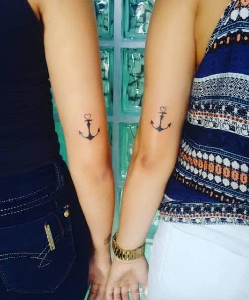 Matching Anchor Tattoos by Alan