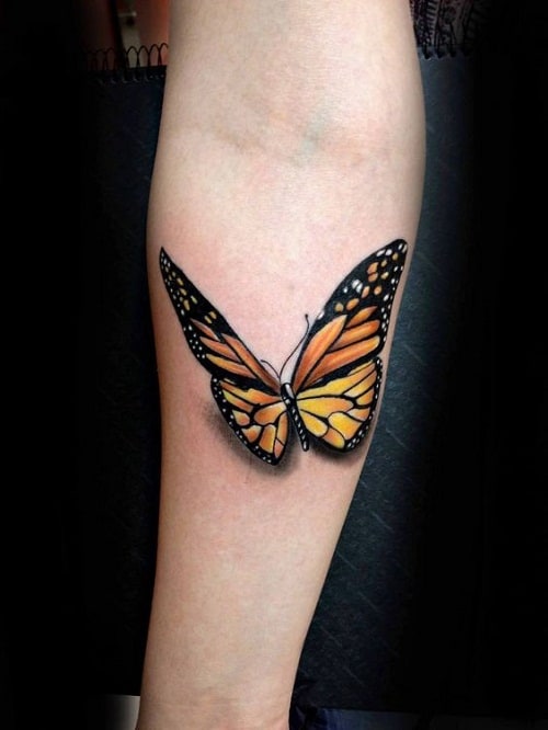Orange and Black Butterfly on Lower Arm Tattoo