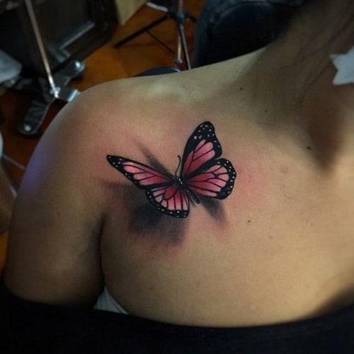 Pink Butterfly on Chest Tattoo