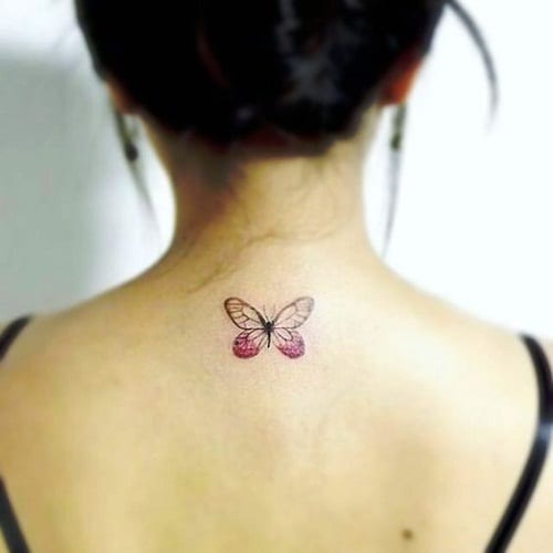 Black ink flying butterflies tattoo on back  Tattoos Butterfly tattoos  for women Butterfly tattoo on shoulder