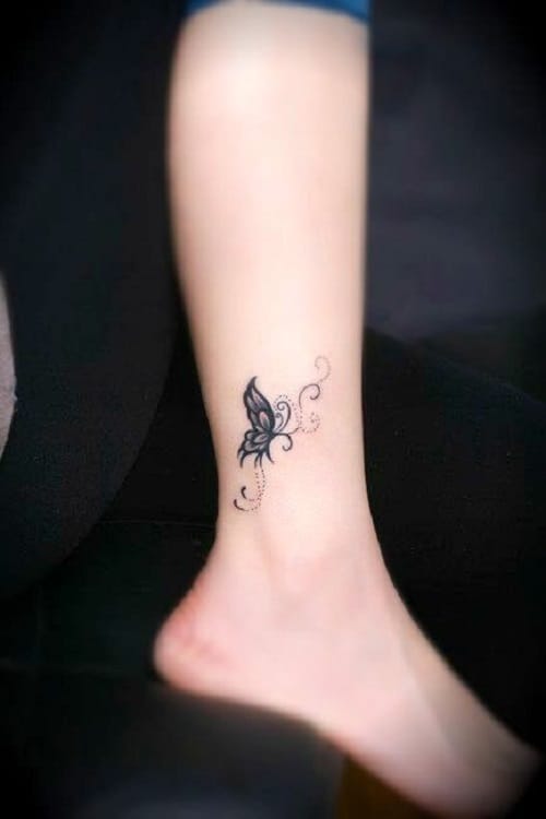 Small Butterfly on Lower Leg Tattoo