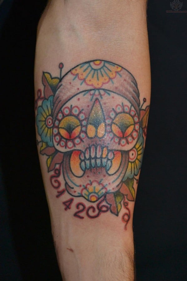 Sugar Skull And Numbering Tattoo On Arm