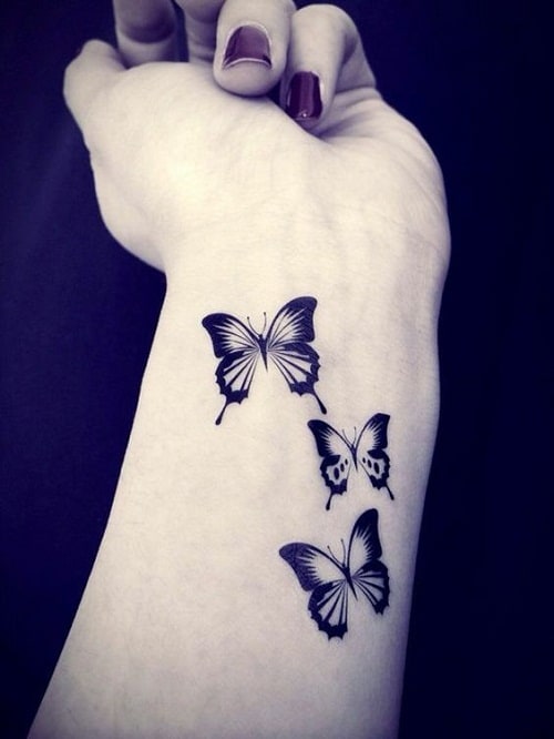 Three Butterflies on Wrist Tattoo