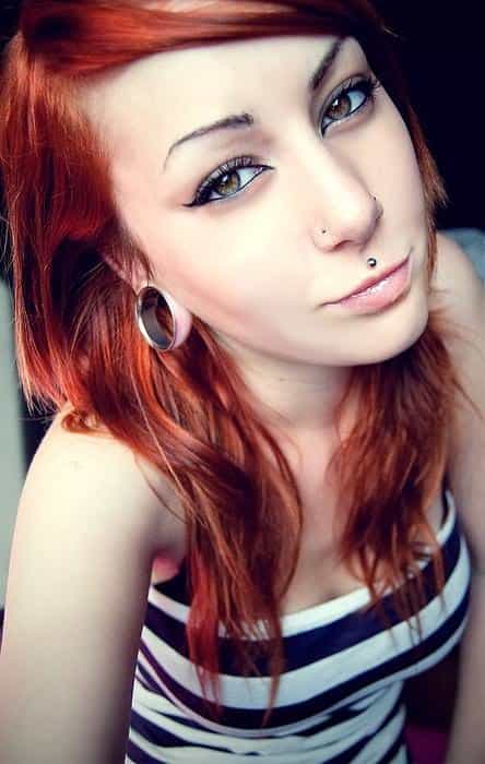 Beautiful Girl With Nose And Medusa Piercing