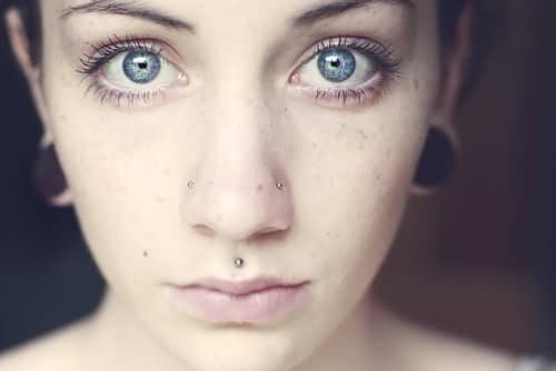 Ear Lobes And Medusa Piercing For Young Girls