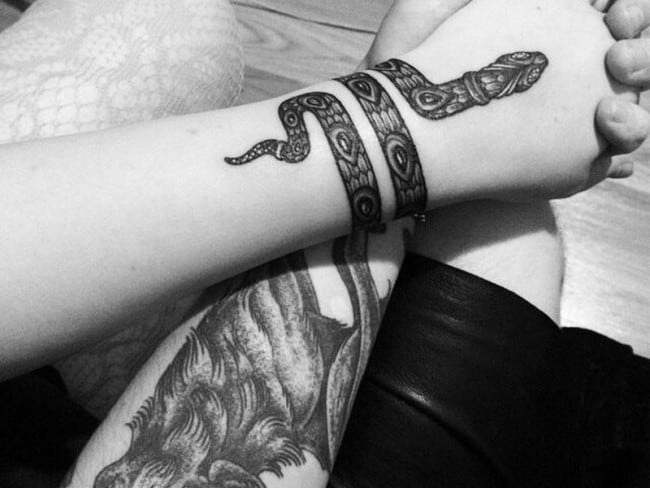 I asked for a tiny braceletsized tattoo and ended up with a snake up half  my arm I was too nervous to say anything  The US Sun