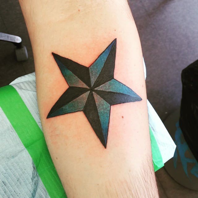 Fine line Bethlehem star tattoo on the shoulder