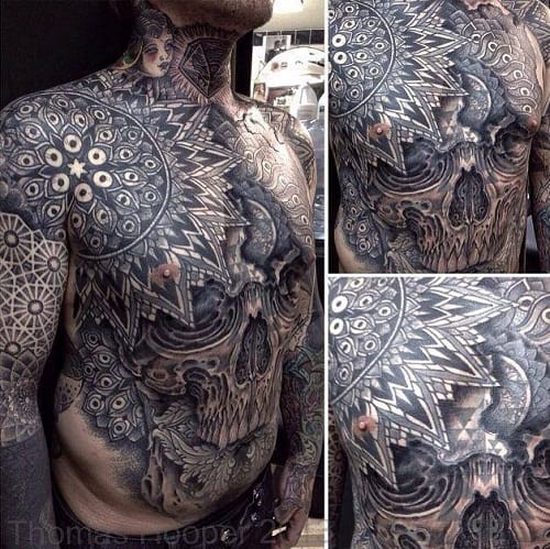 Black Outstanding Skull Tattoo on Stomach