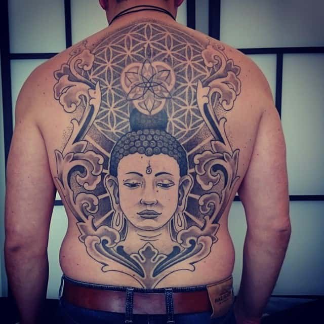 buddha tattoo on man's back