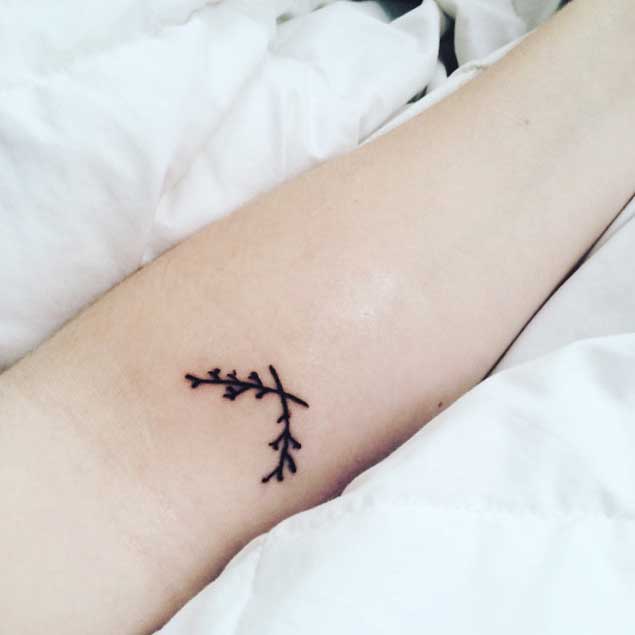 Crossed Branches Tattoo