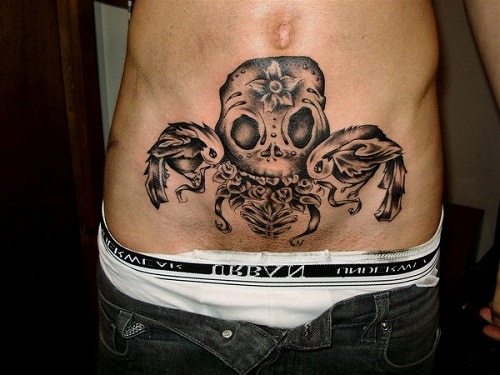 Skull with Birds Tattoo on Stomach