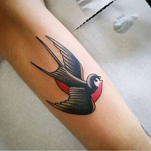 Realistic swallow with open wings tattoo idea | TattoosAI