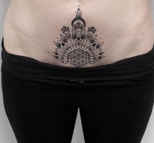 Tribal womb tattoos can look stunning on your belly