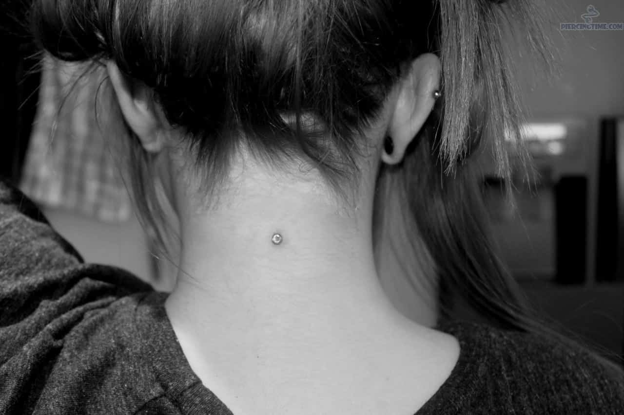 Beautiful Nape Piercing With Single Dermal Anchor