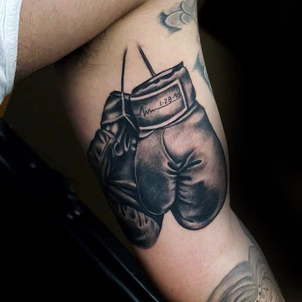 Awesome Memorial Boxing Gloves Tattoo On Guys Inner Arm