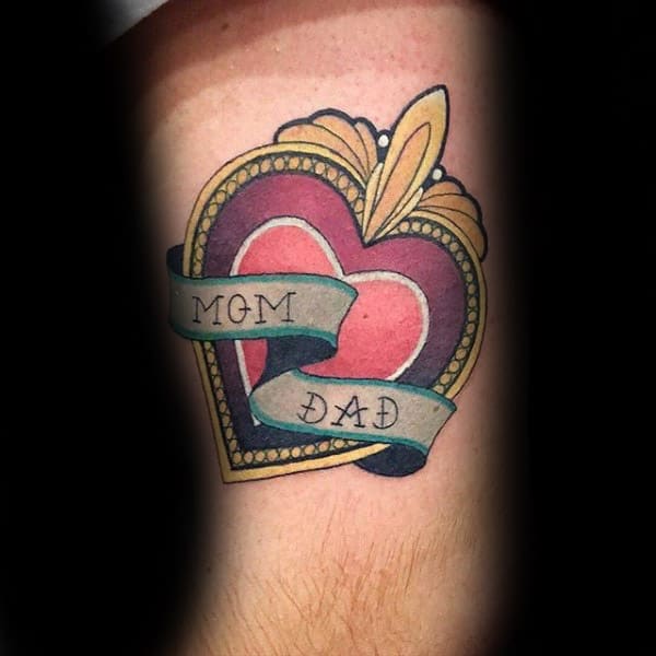 Mom And Dad Memorial Heart Tattoo With Decorative Design On Males Arm