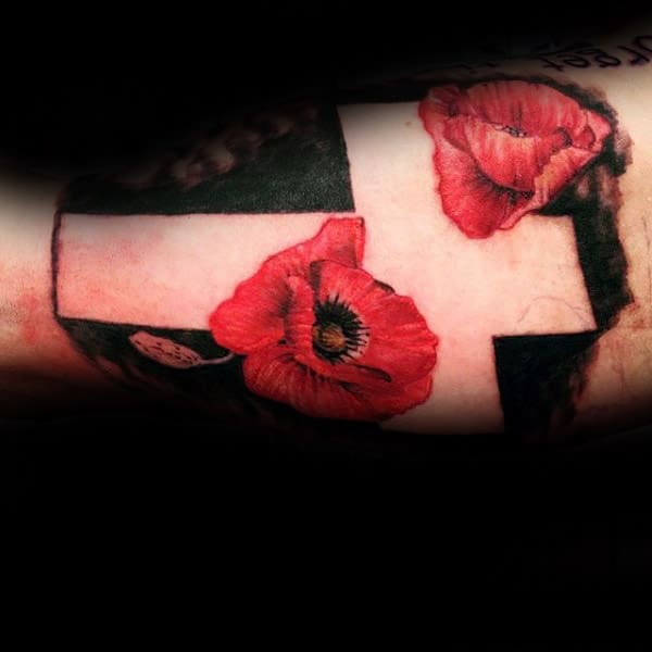 Negative Space Cross With Red Poppy Flowers Memorial Arm Tattoos For Men