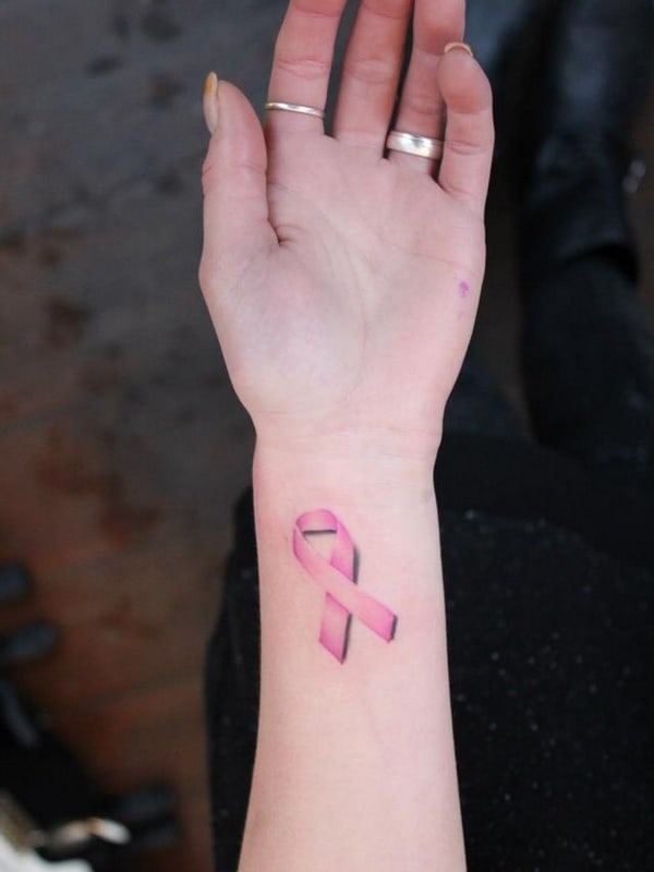 Cancer Ribbons Tattoos Designs : Flowers And Ribbon Cancer Tattoo Design / The vibrancy of a pink tattoo depends, in part, on your skin tone.