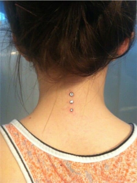 Back Neck Three Microdermal Piercing