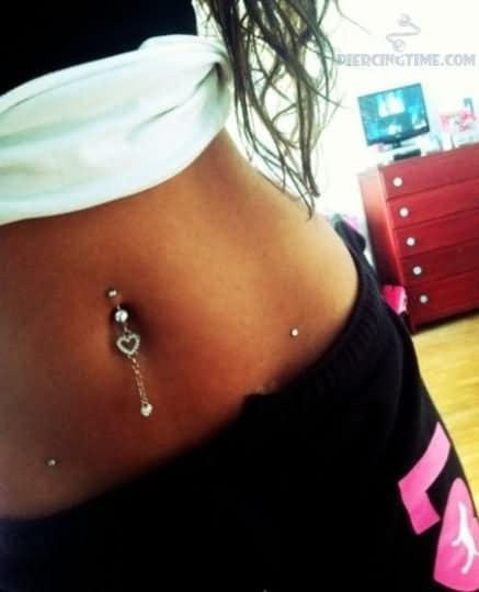 Belly Ring And Anchor Hip Piercing