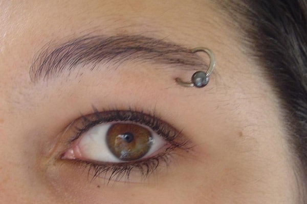 Ultimate Eyebrow Piercing Guide - Procedure, Pain, Healing, Cost & More!