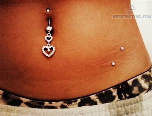 Heart Navel Ring And Hip Piercing
