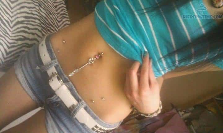 Hip Piercing And Stylish Belly Ring