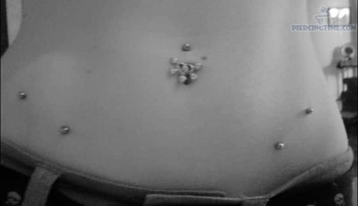 Hip Piercing With Silver Studs