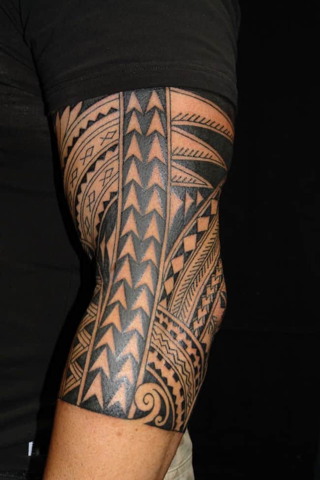 tribal forearm tattoo