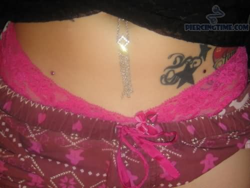 Star Tattoo And Hip Piercing For Girls
