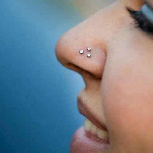 triple nostril piercings